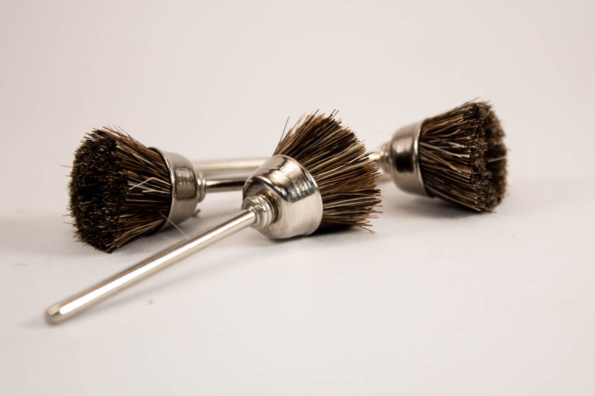 Mounted polishing brushes